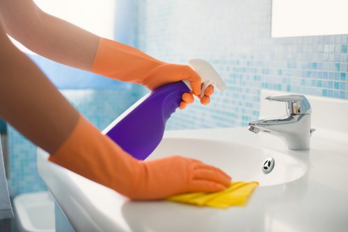 Local cleaner preparing a Westminster rental for new guests