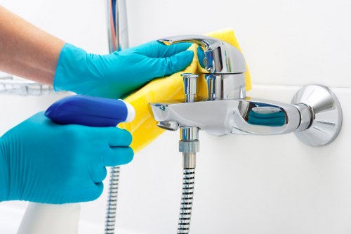 Local carpet cleaner treating hallway carpets in Westminster